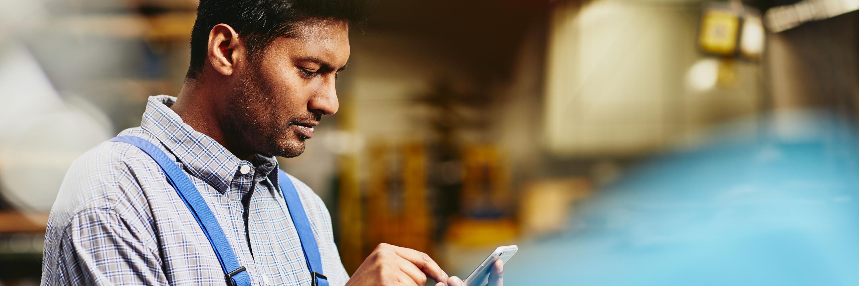 man on a phone at work